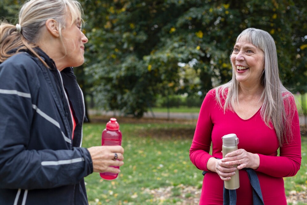 close up women with water bottles 23 2149193332