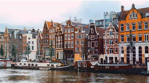 The Impact of Tourism in Amsterdam: Balancing Benefits and Challenges