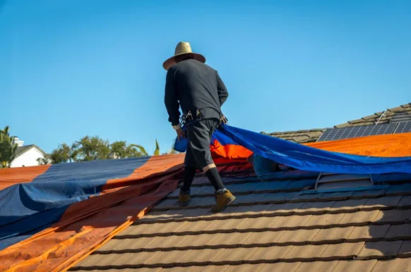 Essential Steps for Emergency Roof Stabilization and Tarping