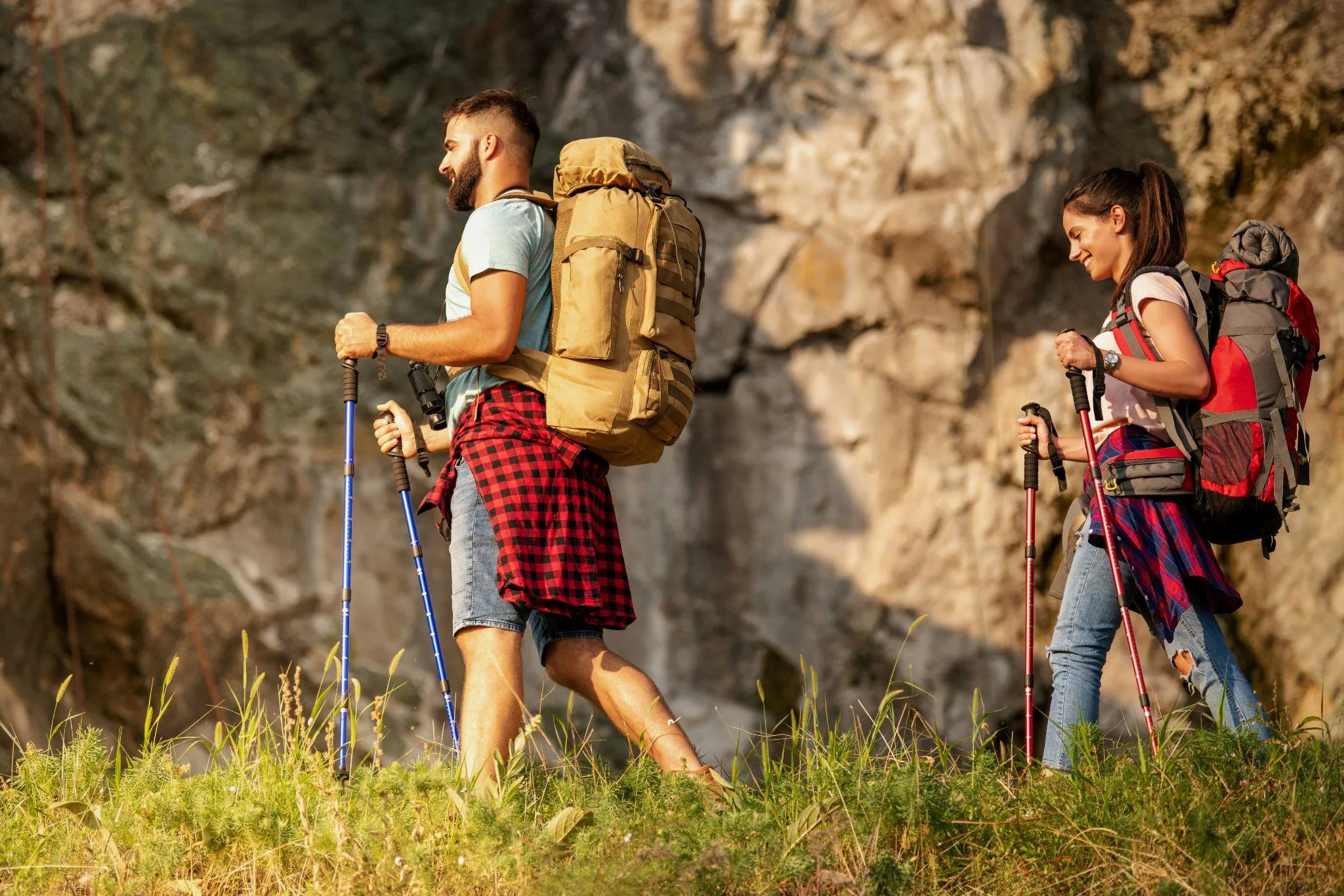 Gabriel Carabello hiking on a mountain trail with backpack, demonstrating beginner-friendly techniques in nature